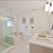 Modern bathroom renovation by Apex Builders